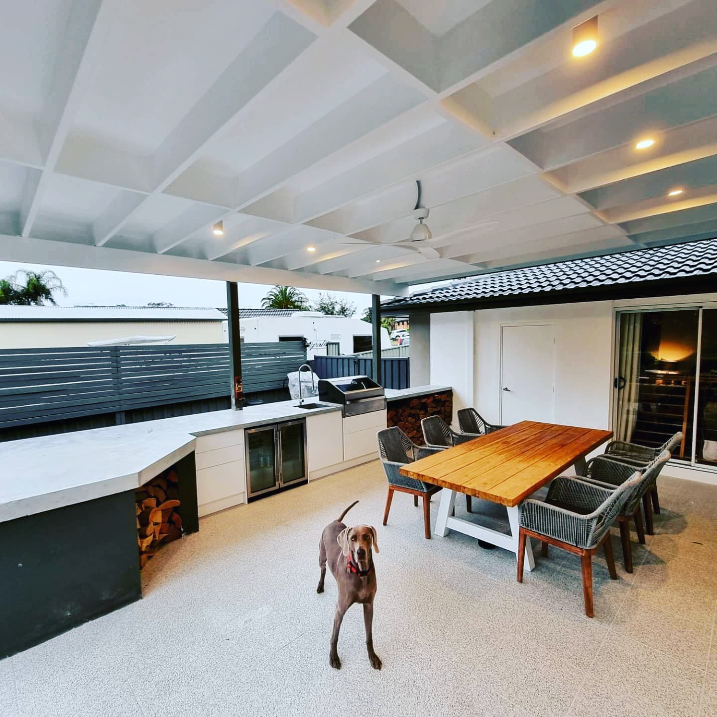 Finished alfresco area with outdoor kitchen and dining