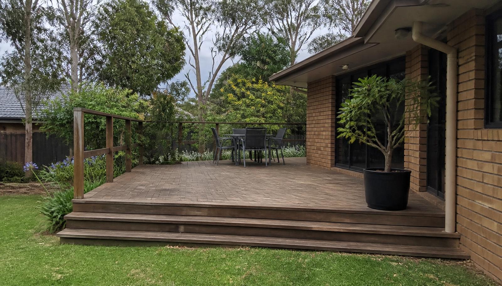 Timber deck with steps and handrail at a Central Coast brick home
