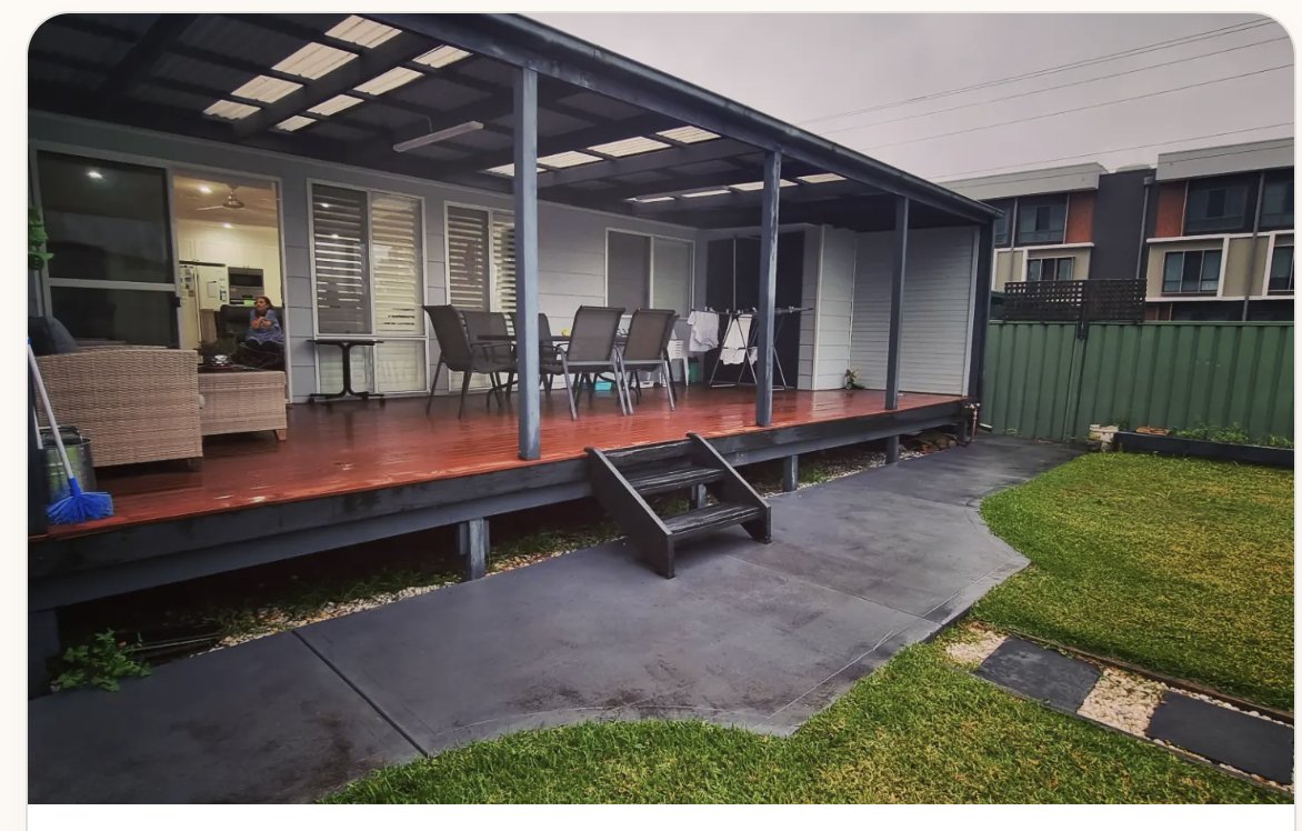 Covered timber deck with pergola roof on a Central Coast home